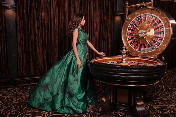 A confident dealer surrounded by casino chips inviting players to access their 588WINBD account, reflecting quick and easy login options.